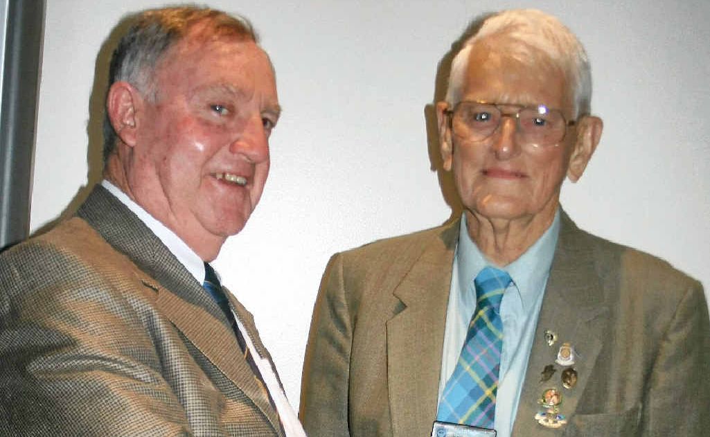 President of the 11th Light Horse Warwick Montrose Troop Russell Brodrick congratulates Harry Gywnne on becoming a patron.